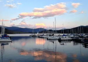 Sailboats docked at serene lake sunset at lake dillon boat rental